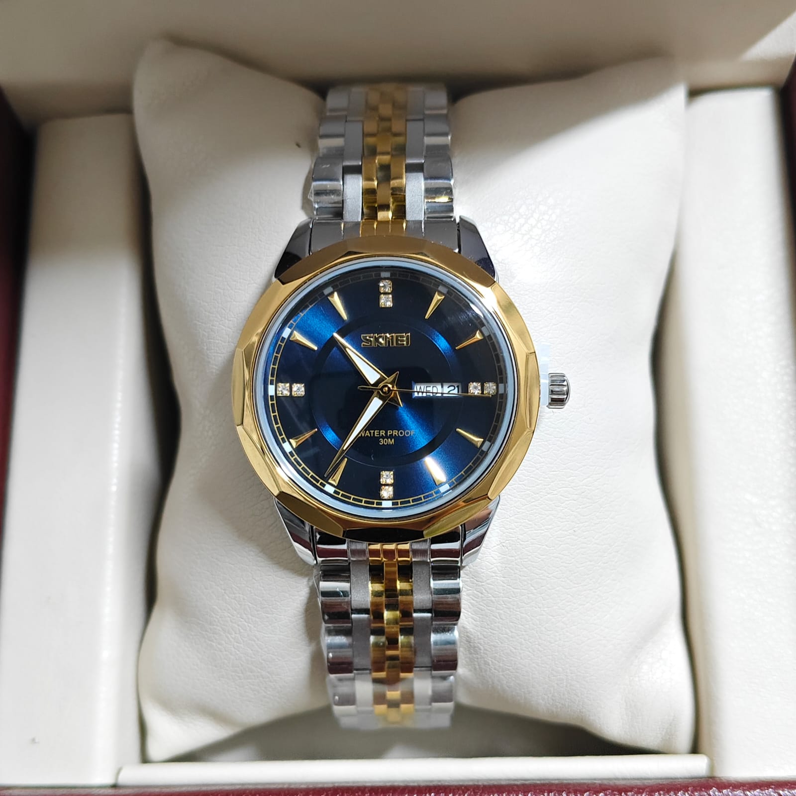 1785507415036_whatsapp_image_2026-07-31_at_8.15.41_pm.jpeg Skmei 9264 For Women – Silver Gold Blue - Image 1
